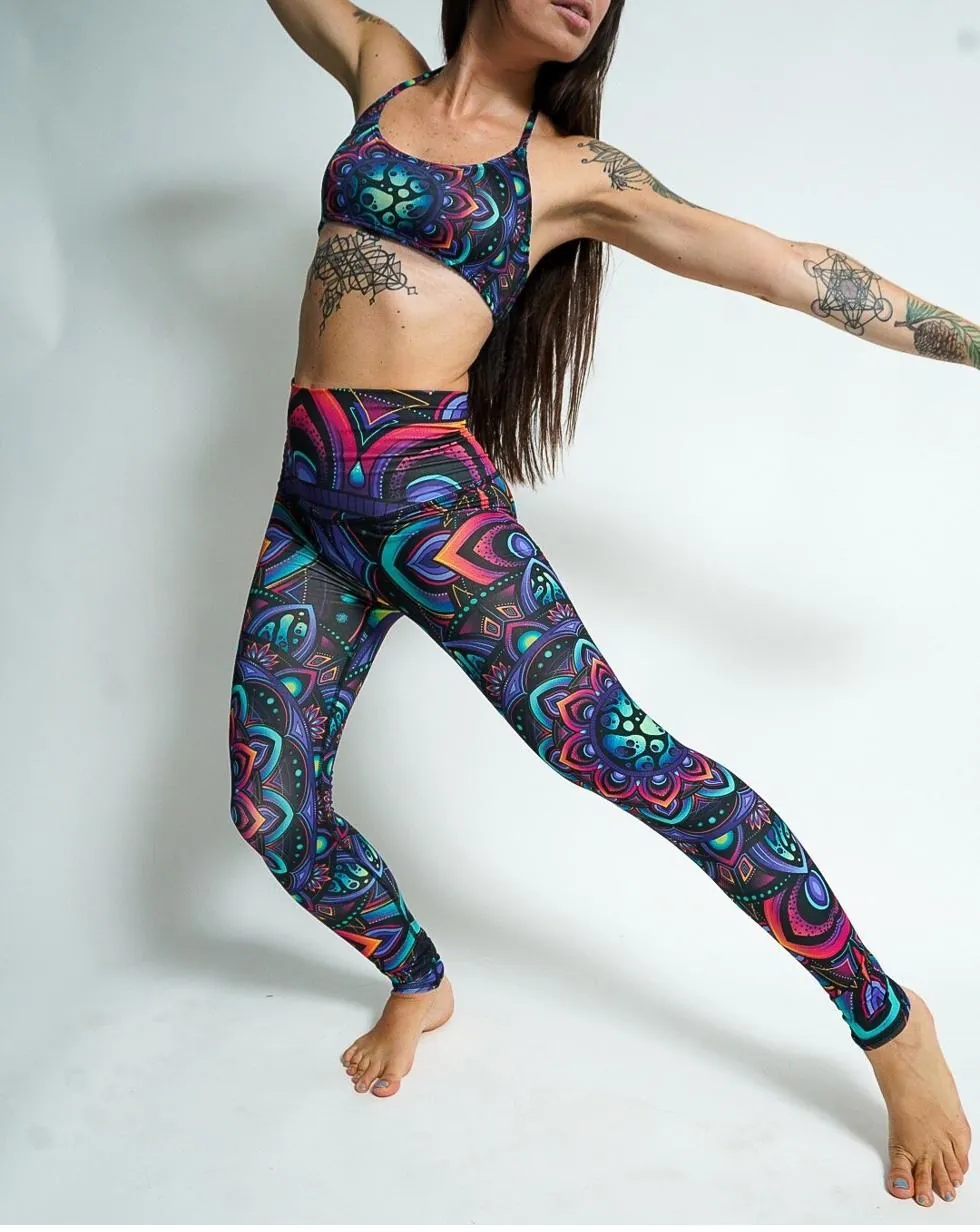 Model wearing printed recycled PET leggings and sports bra